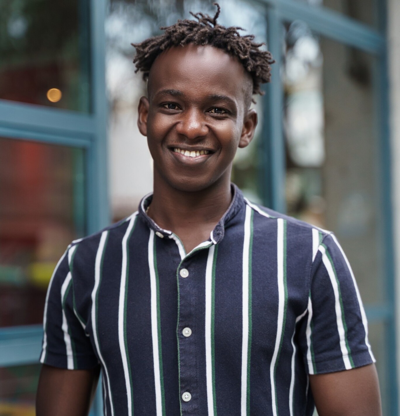 portrait of happy confident african young man with rr5c77z 1.jpg