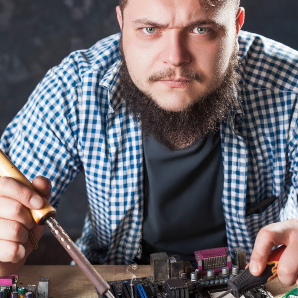 repairman fixing problem with soldering tool p56qraw.jpg